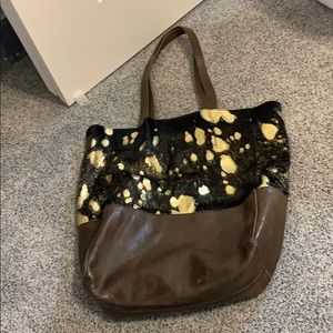 Brave leather, metallic, hide tote purse